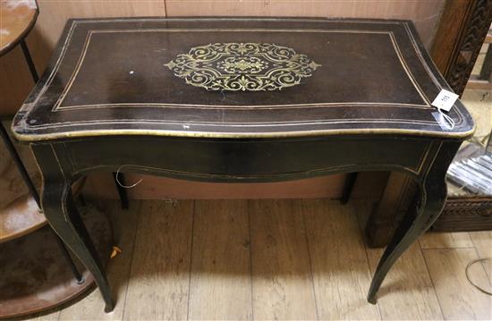 A 19th century French brass inlaid ebonised side table W.88cm